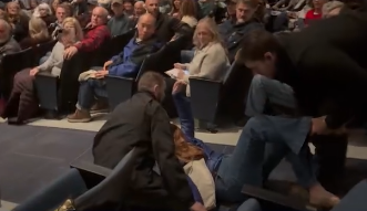 WATCH: Woman is forcibly removed from Idaho town hall meeting by